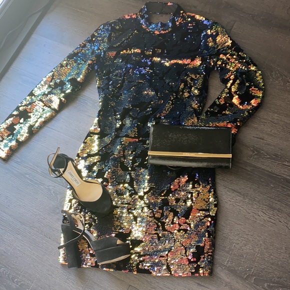 New with tags party dress. This dress is stunning and never been worn. - Picture 9 of 9